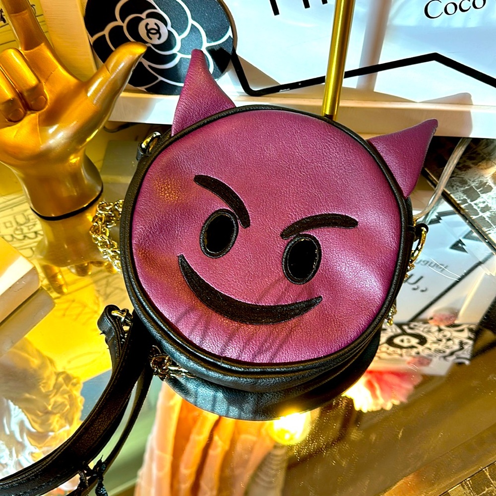 Olivia Miller purple devil cross body circle bag